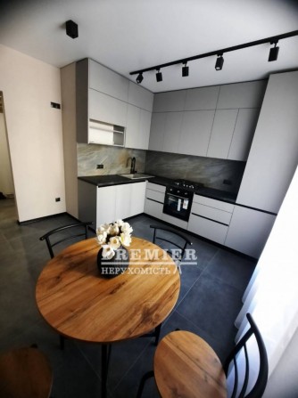 Продам гарну квартиру в новому зданому комплексі з якісним ремонтом - фото 1