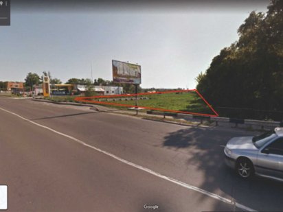 Перехрестя ТЦ Жираф, фасад, під ТЦ або АЗС. Ірпінь на виїзді до Бучі. Ірпінь