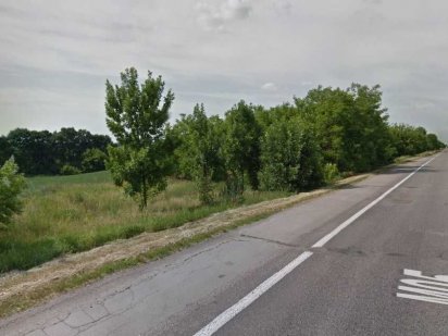 Земельна ділянка 1,5 га. Фасад одеської траси.