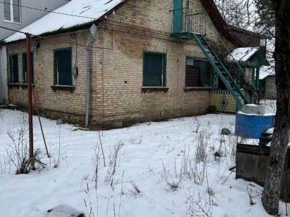 Продаж діляки з будинком під реконстр. в Ірпені,вул.Северинівська..