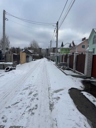 Вул. Помаранчева, 25.земельні ділянки. Жуляни. . Власник - фото 1