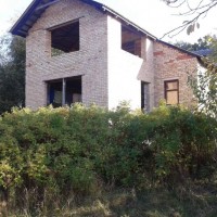 Продам пів будинку недобудований в с. Пороскотень Буча