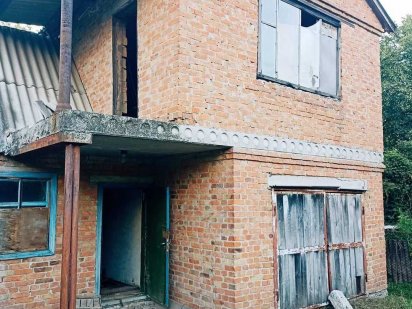 Земельна ділянка із забудовою Лубни