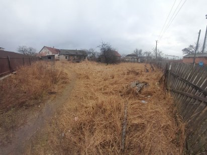 Продається земля з будинком під знос в м. Малин в р-ні ж/д вокзалу Малин