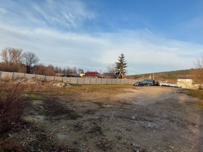 Продам ділянку зі складським приміщенням. Вул.Коцюбинського. Могилев-Подольский