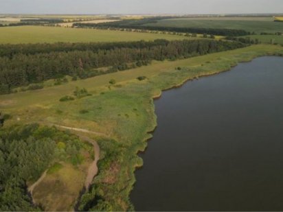 Продам земли  – 2,3 га на берегу водоема Чугуев