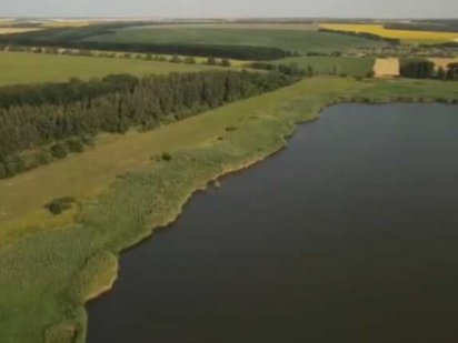 Продам  участок с видом на сосновый лес и водоем Чугуев