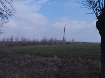 Продаю земельну ділянку фасад траса на Шкарівку