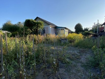 Участок з домівкою Буча