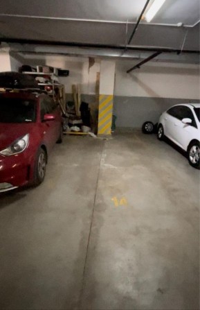 Продам парковочное место в паркинге - фото 1