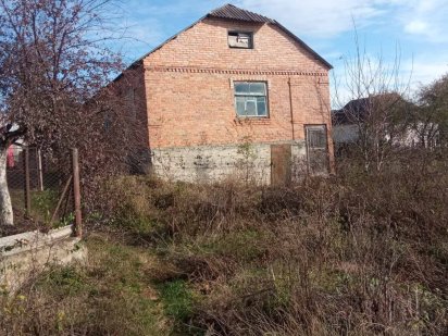 Продам терміново недорого земельну ділянку з незавершеним будівництвом Хмельник