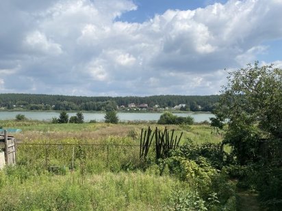 Земля з будинком в Забірі