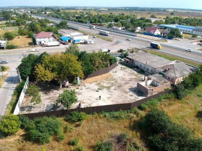 Участок Фасад Житомирская  трасса  с.Любимовка 25 соток + 454м2 здание