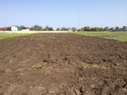 Земля за колісним заводом Піщане