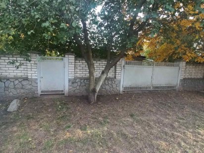 Земельна ділянка з не добудованим будинком Песчаное