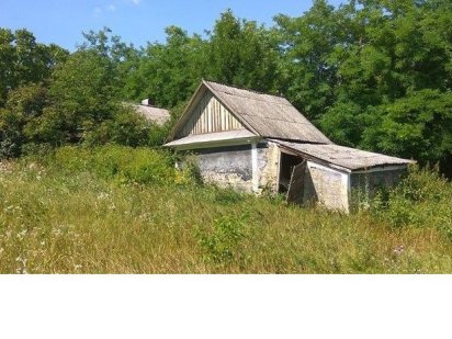 Продам земельну ділянку з будиночком Должок