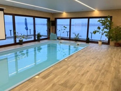 #638 Будинок подобово біля річки з теплим басейном