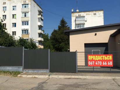 Житлово комерційна будівля Тальное