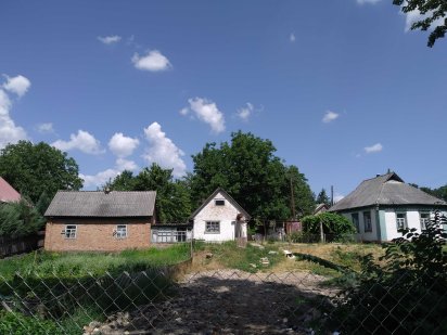 Земельна ділянка з будинком та господарськими будівлями в м. Миргород Миргород