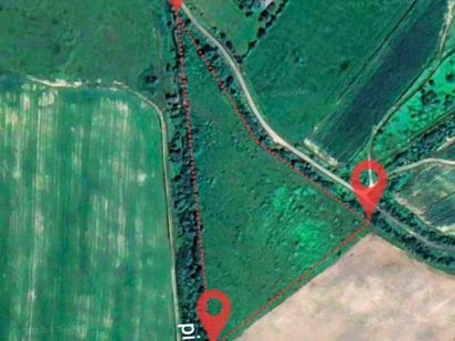 Земельна ділянка в м.Хуст, на проміжку об'їзної дороги Іза-Тячів Хуст