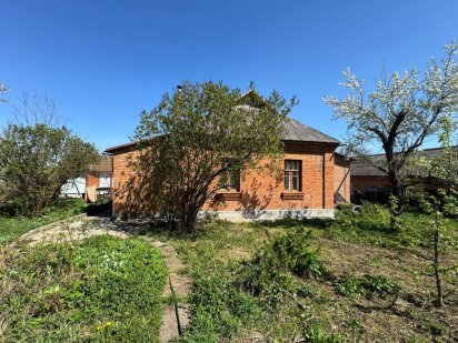 Продаж земельноі ділянки з будинком