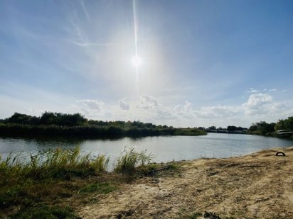 Продам участок 10 соток в г Подгородном, рядом  с речкой Подгородное