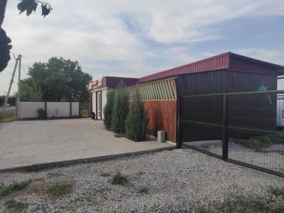 Продам земельный участок 50 соток, и действующий  магазин.