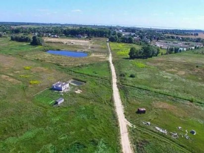 Участок в пгт. Дымер 12 сот. с электричеством