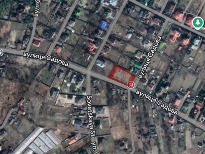 Іванковичі, фасад центральноі дороги 18 соток