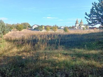 Ділянка 18 соток у Рожівці з прямим виходом до лісу Рожевка