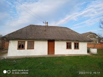 Продається будинок  на земельній ділянці 0,25 га Заставна