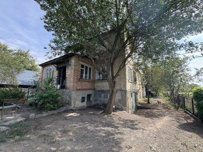 Ділянка з будинком  в ліквідному місці Буча!