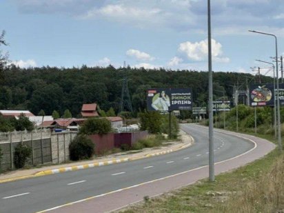 Фасадна земельна ділянка біля нового базару та траси на Київ