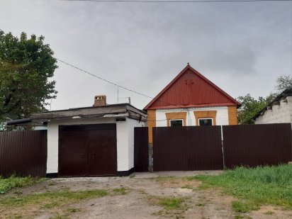Дом в Радушной, гараж на Балхашской Кривой Рог