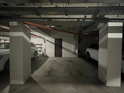 Паркомісце з кладовою кімнатою в Центрі Полтава