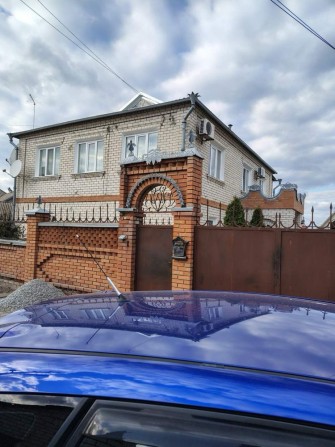 Продам дом в Изюме - фото 1