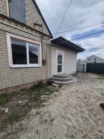 Продам кирпичный дом в городе - фото 1
