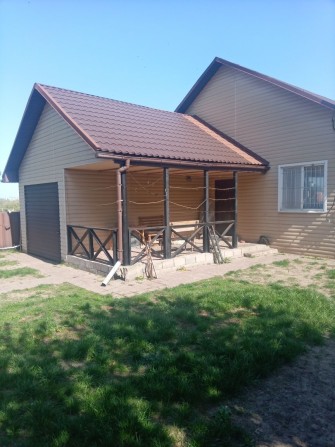 Будинок за таращянським масивом летра на березі річки - фото 1