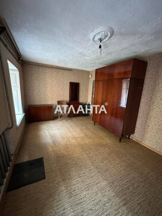 1 комната в коммунальной квартире со своей кухней. - фото 1