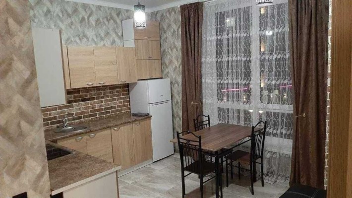 Квартира с ремонтом в сданном кирпичном доме - фото 1