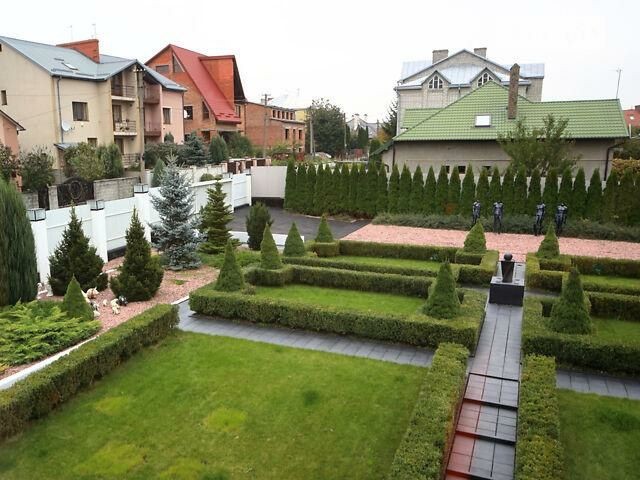 Будинок загальна площа забудови 1000 м², 31 сотка землі - фото 1