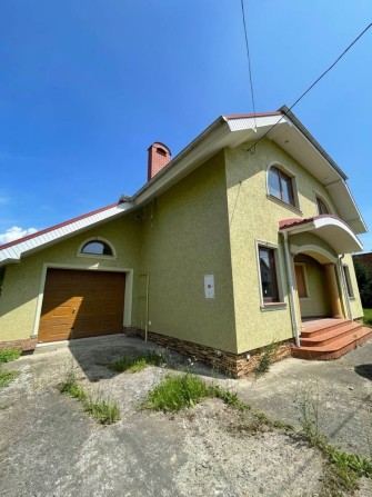 Розкішний будинок з атмосферою сімейного затишку - фото 1
