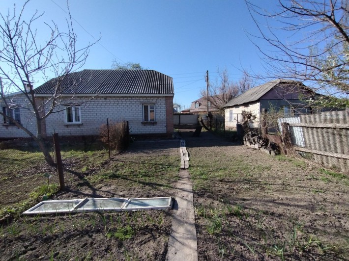 Подусівка. Продається 50% на право власності землею та будинком. - фото 1