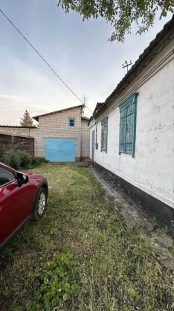 Диевка 1  Продам 1/2 дома площадью 61кв.м. с капитальным гаражом - фото 1
