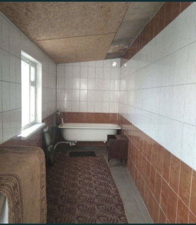 Здається кімната в трьох кімнатній квартирі в центрі - фото 1