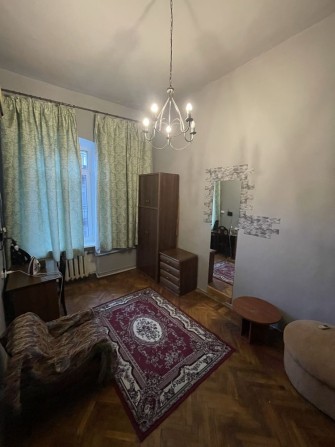 Оренда кімнати в комунальній квартирі в центрі міста - фото 1