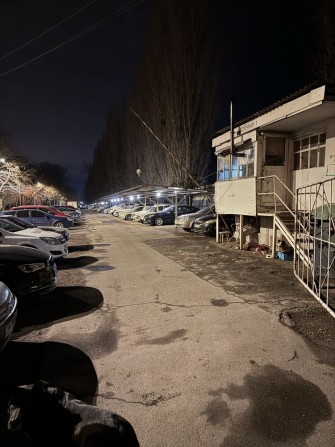 Сдам / продам место на стоянке на Бочарова / Жолио Кюри - фото 1