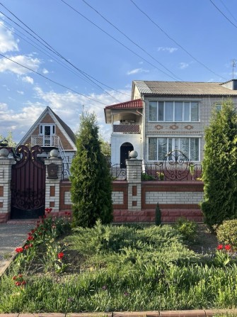 3-кімнатна квартира з власним двором, гаражем і терасою в центрі міста - фото 1