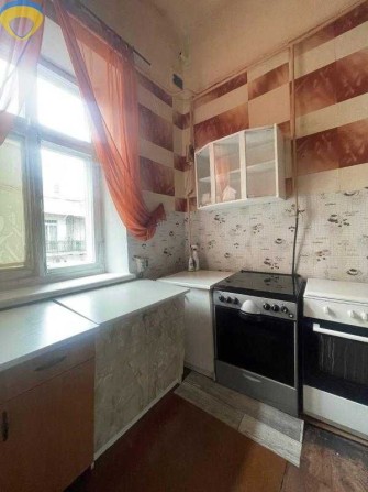 В продаже 2 комнаты в коммунальной квартире на ул. Екатерининской. - фото 1