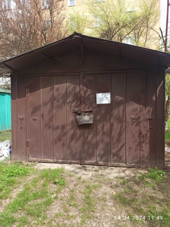 Гараж металевий розборний перекритий профільним листом - фото 1